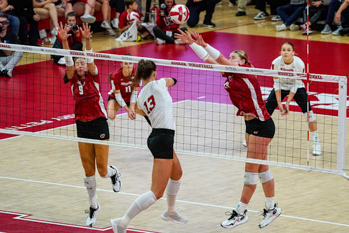 Oct 21, 2023; Lincoln, NE, USA; Wisconsin Badgers outside hitter Sarah Franklin (13) blocks Nebraska Cornhuskers outside hitter Merritt Beason (13) during the second set at the Bob Devaney Sports Center. Mandatory Credit: Dylan Widger-USA TODAY Sports